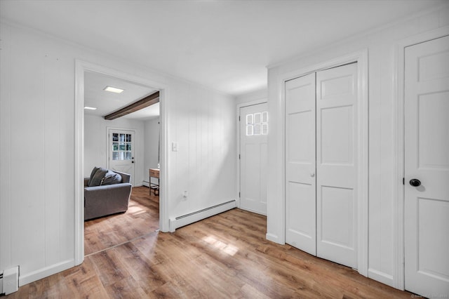 75 Carll Rd, Middletown, CT 06457 - entryway featuring a baseboard heating unit, light wood-type flooring, and a baseboard radiator