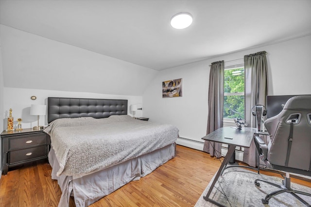75 Carll Rd, Middletown, CT 06457 - bedroom featuring baseboard heating, wood finished floors, lofted ceiling, and a desk