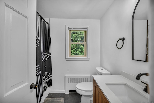75 Carll Rd, Middletown, CT 06457 - bathroom with radiator heating unit, toilet, vanity, curtained shower, and baseboards