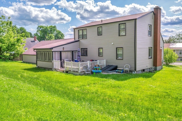 75 Carll Rd, Middletown, CT 06457 - rear view of property featuring a chimney, a lawn, a wooden deck, and a sunroom