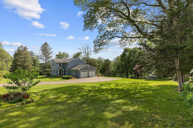 403 Bethmour Rd, Bethany, CT 06524 - view of grassy yard with an attached garage and concrete driveway