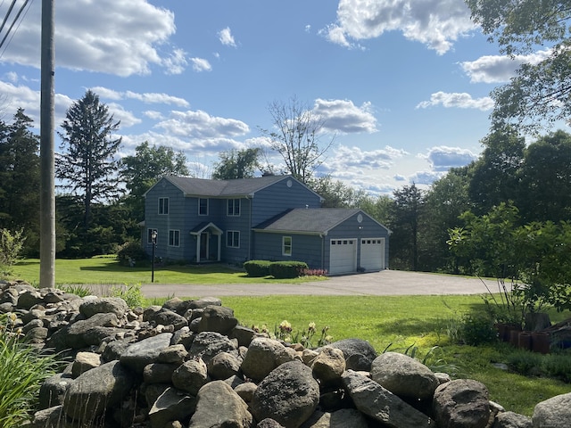 403 Bethmour Rd, Bethany, CT 06524 - colonial home with driveway, a front yard, and an attached garage