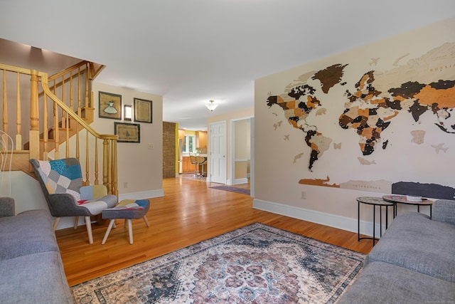 403 Bethmour Rd, Bethany, CT 06524 - living area with wood finished floors, stairway, and baseboards
