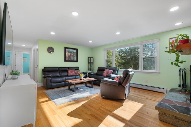 403 Bethmour Rd, Bethany, CT 06524 - living room with a baseboard radiator, light wood-type flooring, and recessed lighting