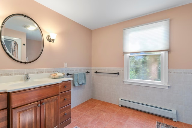 403 Bethmour Rd, Bethany, CT 06524 - full bathroom featuring a baseboard radiator, tile walls, vanity, a wainscoted wall, and tile patterned flooring