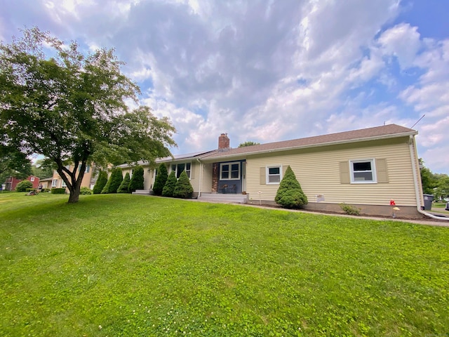 1 Deerfield Rd, Enfield, CT 06010 - rear view of property featuring a chimney and a lawn