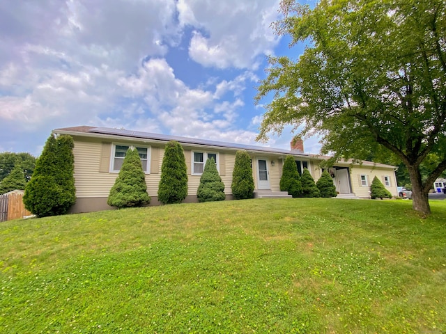 1 Deerfield Rd, Enfield, CT 06010 - single story home featuring solar panels, a chimney, and entry steps