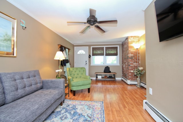 1 Deerfield Rd, Enfield, CT 06010 - living area with baseboard heating, light wood-style flooring, a ceiling fan, and crown molding