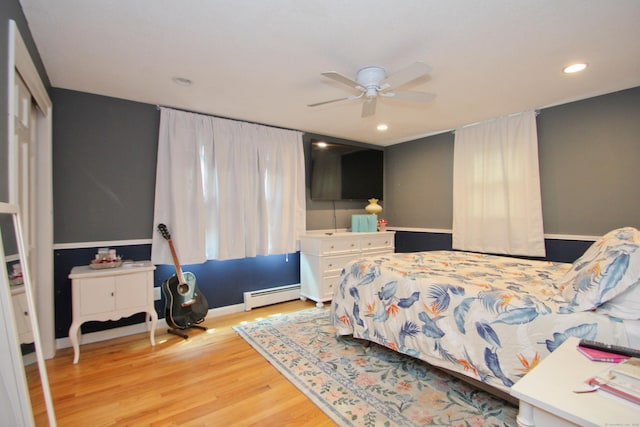 1 Deerfield Rd, Enfield, CT 06010 - bedroom with a baseboard radiator, wood finished floors, recessed lighting, and a ceiling fan