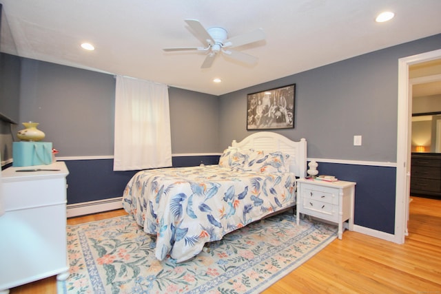 1 Deerfield Rd, Enfield, CT 06010 - bedroom with a baseboard radiator, wood finished floors, recessed lighting, and ceiling fan