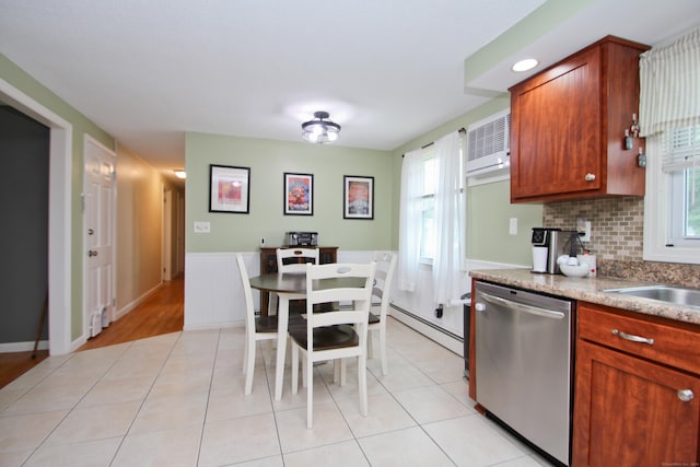 1 Deerfield Rd, Enfield, CT 06010 - kitchen featuring dishwasher, a baseboard heating unit, tasteful backsplash, brown cabinetry, and light tile patterned flooring