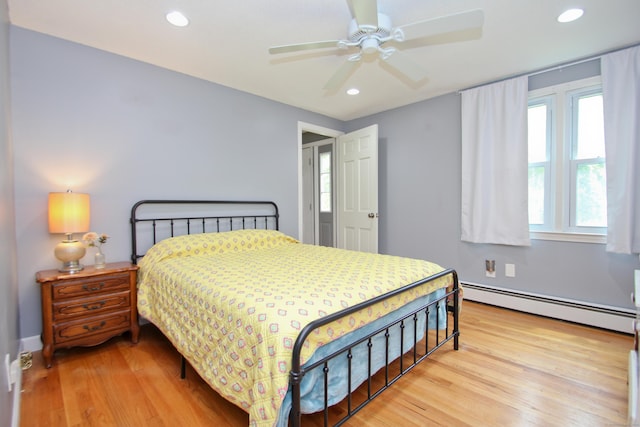 1 Deerfield Rd, Enfield, CT 06010 - bedroom with a baseboard radiator, wood finished floors, recessed lighting, and ceiling fan