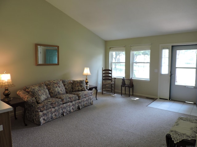 33 Shares Ln Unit 33, South Windsor, CT 06074 - carpeted living room with lofted ceiling and baseboards
