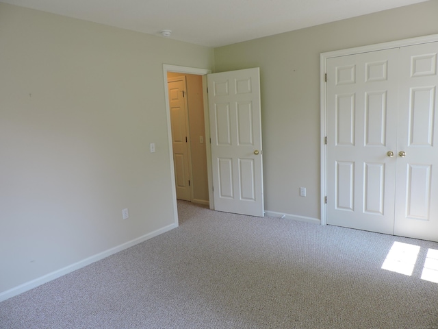 33 Shares Ln Unit 33, South Windsor, CT 06074 - unfurnished bedroom with light carpet and a closet