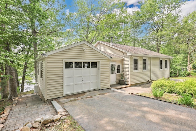 60 Indian Spring Rd, Woodstock, CT 06281 - ranch-style home featuring driveway and an attached garage