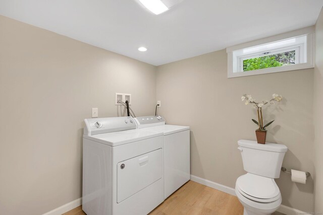 60 Indian Spring Rd, Woodstock, CT 06281 - laundry area featuring washing machine and clothes dryer, light wood-style flooring, and baseboards