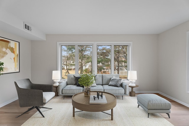 80 Seaview Ter Unit 12, Guilford, CT 06437 - living room featuring wood finished floors