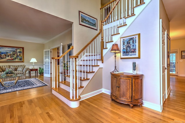 55 Riding Ridge Rd, Monroe, CT 06468 - stairs featuring wood finished floors and crown molding