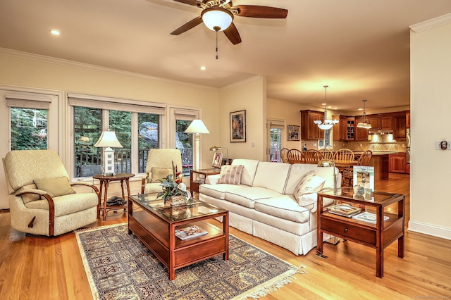 55 Riding Ridge Rd, Monroe, CT 06468 - living room with a ceiling fan, light wood-style floors, recessed lighting, ornamental molding, and a chandelier