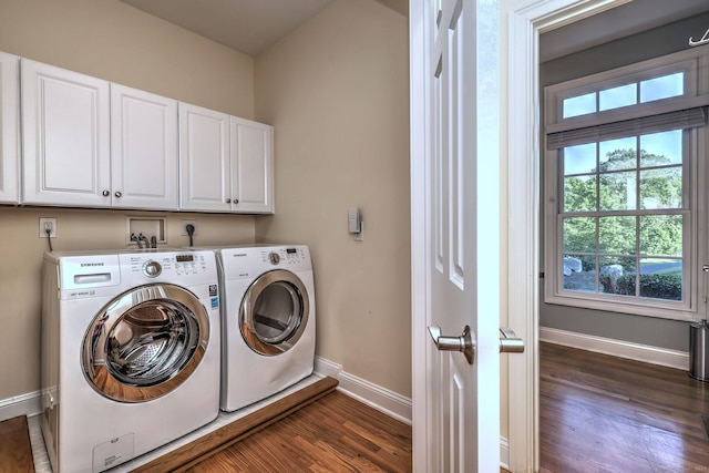 55 Riding Ridge Rd, Monroe, CT 06468 - washroom featuring cabinet space, washer and dryer, dark wood-type flooring, and healthy amount of natural light