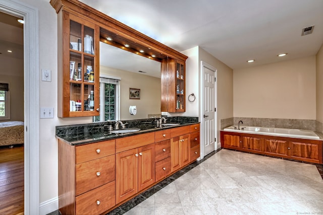 55 Riding Ridge Rd, Monroe, CT 06468 - bathroom featuring double vanity, a garden tub, ensuite bath, and recessed lighting