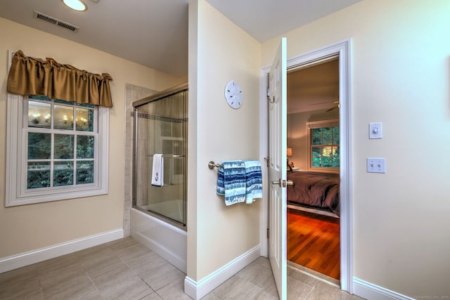 55 Riding Ridge Rd, Monroe, CT 06468 - ensuite bathroom with combined bath / shower with glass door, tile patterned flooring, and a ceiling fan
