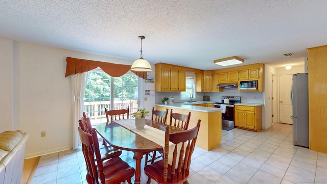 26 Reno Dr, Middletown, CT 06457 - dining room with a textured ceiling and light tile patterned flooring