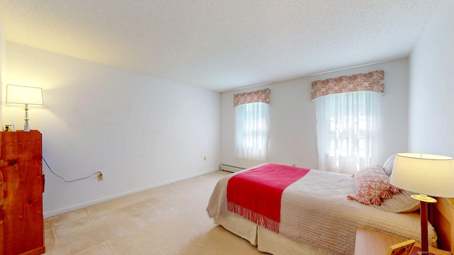 26 Reno Dr, Middletown, CT 06457 - bedroom featuring carpet flooring, a textured ceiling, a baseboard radiator, and baseboards