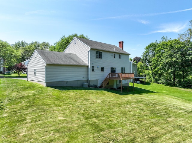 26 Reno Dr, Middletown, CT 06457 - back of house with a deck, stairs, a yard, a chimney, and a shingled roof