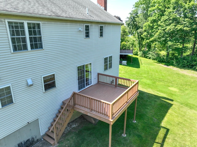 26 Reno Dr, Middletown, CT 06457 - back of property featuring a chimney, a deck, a lawn, roof with shingles, and stairs