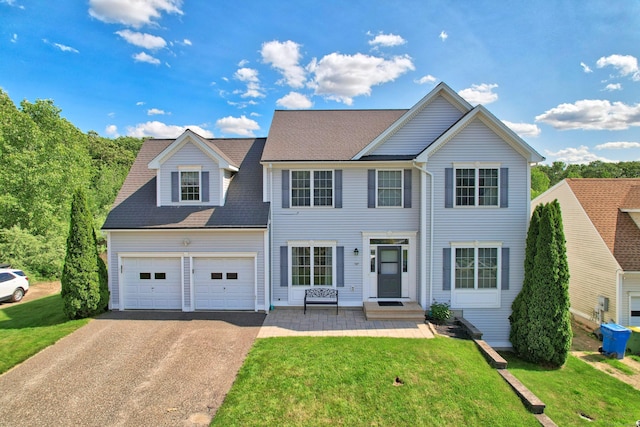 280 Ridgefield Ave, Waterbury, CT 06705 - view of front facade with asphalt driveway and a front yard