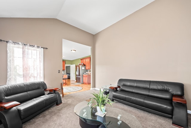 280 Ridgefield Ave, Waterbury, CT 06705 - living area with vaulted ceiling, light carpet, and baseboards