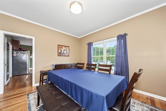 280 Ridgefield Ave, Waterbury, CT 06705 - dining area featuring ornamental molding, wood finished floors, and baseboards