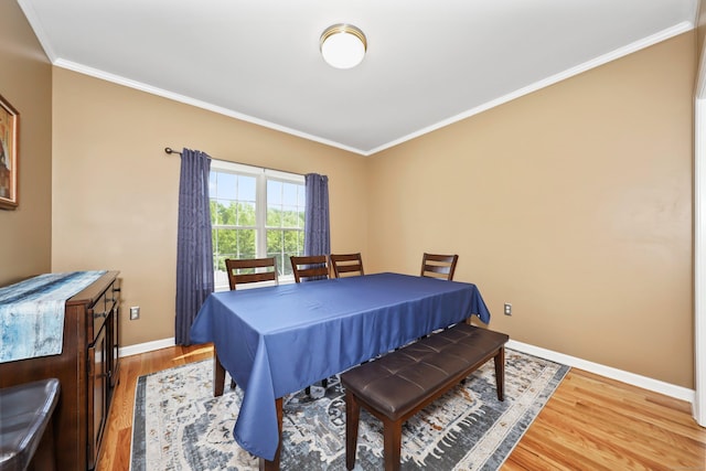 280 Ridgefield Ave, Waterbury, CT 06705 - dining space featuring crown molding, baseboards, and wood finished floors