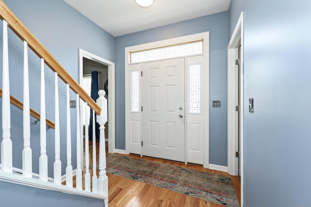 280 Ridgefield Ave, Waterbury, CT 06705 - entrance foyer featuring wood finished floors, baseboards, and stairway