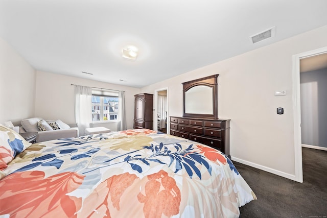 280 Ridgefield Ave, Waterbury, CT 06705 - bedroom with dark carpet, baseboards, and arched walkways