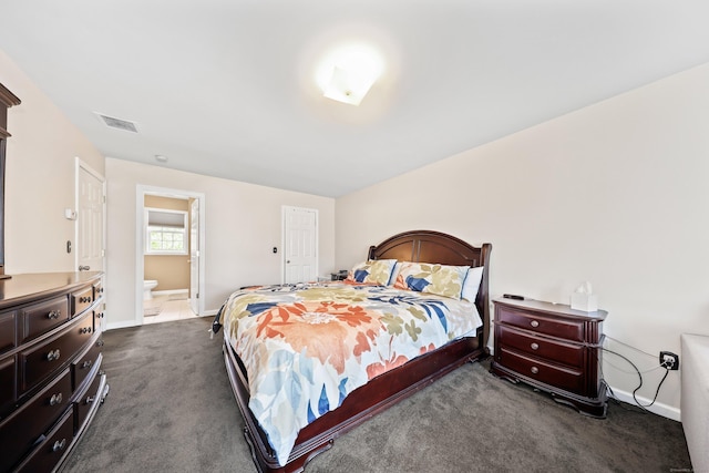 280 Ridgefield Ave, Waterbury, CT 06705 - bedroom featuring dark colored carpet, baseboards, and ensuite bath