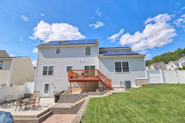 280 Ridgefield Ave, Waterbury, CT 06705 - back of house with a gate, a patio area, roof mounted solar panels, a wooden deck, and stairs