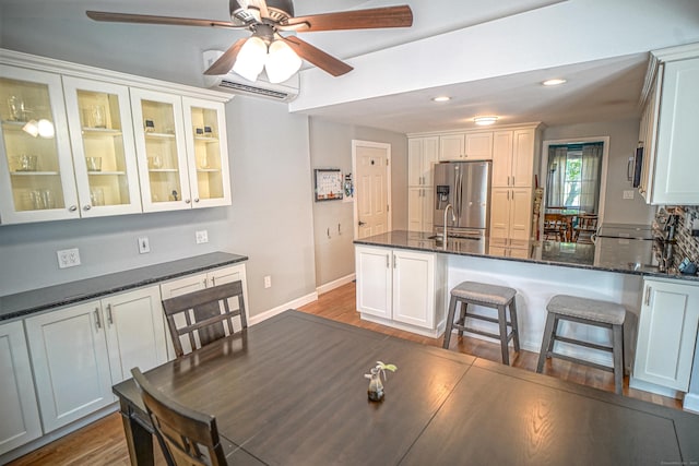 49 Hintz Dr, Wallingford, CT 06492 - dining area featuring a ceiling fan, dark wood-type flooring, recessed lighting, and baseboards
