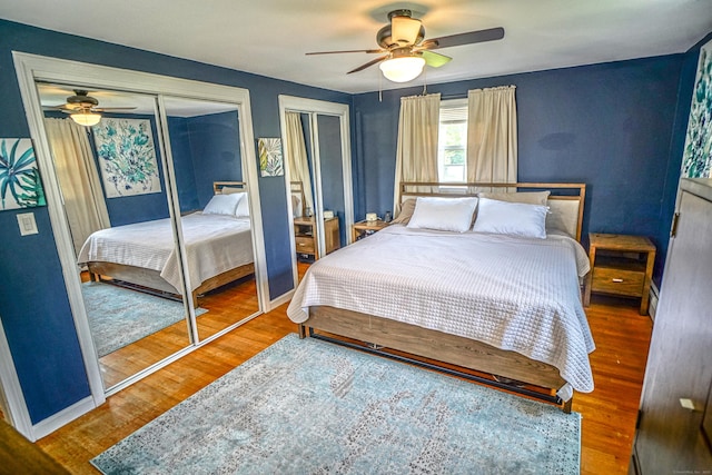 49 Hintz Dr, Wallingford, CT 06492 - bedroom with two closets, wood finished floors, and ceiling fan