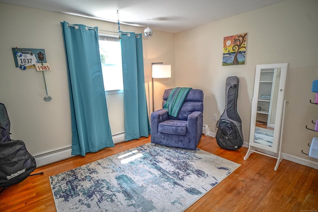 49 Hintz Dr, Wallingford, CT 06492 - living area with wood finished floors and baseboard heating