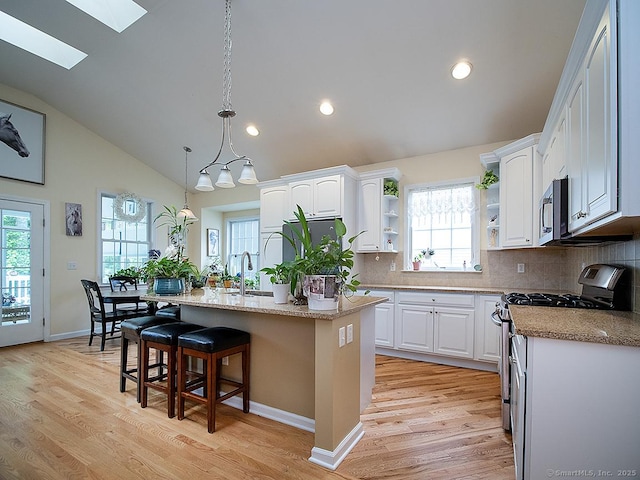 3 Timberland Way Unit 3, Beacon Falls, CT 06403 - kitchen featuring stainless steel appliances, a skylight, open shelves, white cabinetry, and recessed lighting