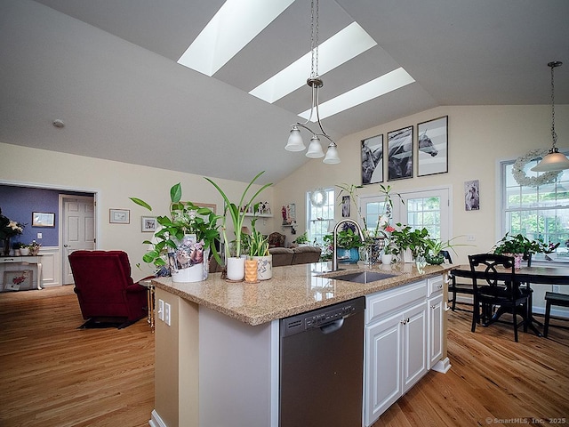 3 Timberland Way Unit 3, Beacon Falls, CT 06403 - kitchen with dishwasher, open floor plan, a sink, light wood-type flooring, and vaulted ceiling