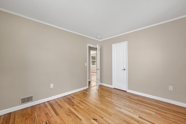 170 Morningside Dr E, Bristol, CT 06010 - spare room featuring baseboards, light wood-style floors, and ornamental molding