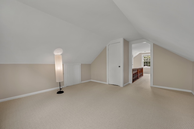 170 Morningside Dr E, Bristol, CT 06010 - additional living space featuring light carpet, vaulted ceiling, and baseboards