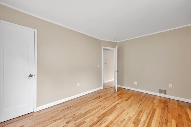 170 Morningside Dr E, Bristol, CT 06010 - empty room with baseboards, wood finished floors, and crown molding