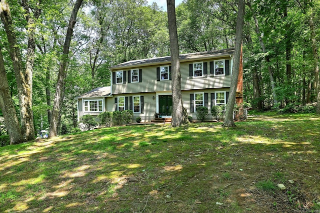 31 Country Ridge Dr, Monroe, CT 06468 - view of front of house with a front yard and view of wooded area