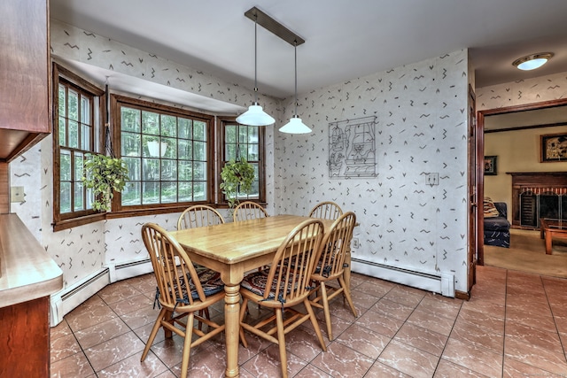 31 Country Ridge Dr, Monroe, CT 06468 - dining space with a baseboard radiator, wallpapered walls, tile patterned flooring, and a fireplace