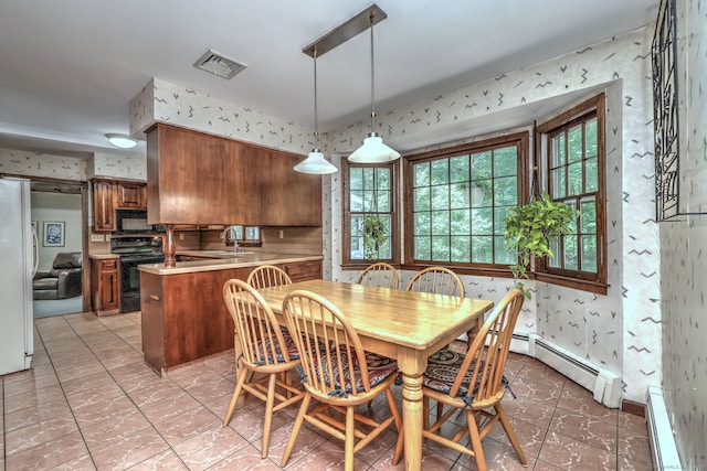 31 Country Ridge Dr, Monroe, CT 06468 - dining area with wallpapered walls, a baseboard heating unit, plenty of natural light, and light tile patterned floors