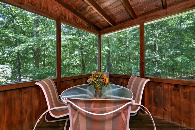31 Country Ridge Dr, Monroe, CT 06468 - sunroom featuring wood ceiling, wood walls, and outdoor dining space